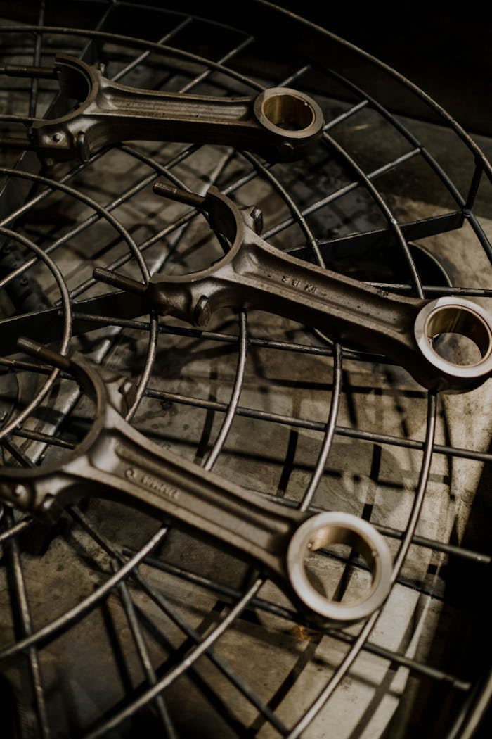 Detailed image of metal wrenches on a circular gear, ideal for repair and mechanical themes.